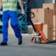 worker using pallet jack